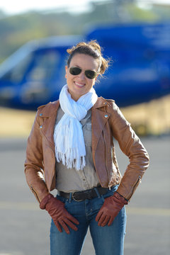 portrait of a confident female helicopter pilot