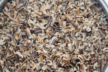A pot with steamed black rice close-up