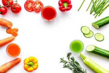 Wellness elements. Colorful detox drinks with vegetables  on white background top view copyspace