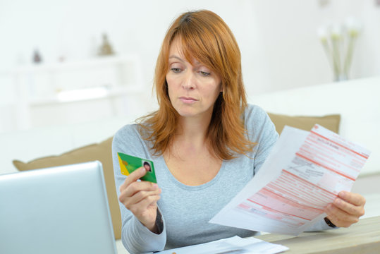 woman checking her medical insurance