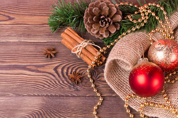 Christmas and New Year holiday background. Christmas decor on a wooden table. Top view, blank space