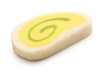 Marzipan isolated on white background pineapple citron taste yellow green one roll.