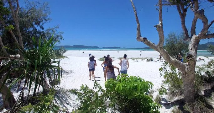 WHITSUNDAY ISLANDS &ndash; FEBRUARY 2016 : Aerial shot of people running towards ocean on Whitehaven Beach on a beautiful day 