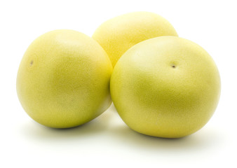 Pamelo isolated on white background three yellow pale green whole.