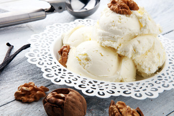 homemade oatmeal and walnut ice cream on wooden background
