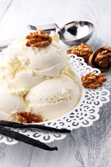 homemade oatmeal and walnut ice cream on wooden background