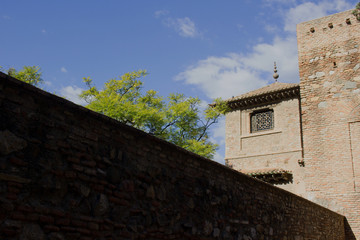 Fototapeta na wymiar Details of ancient decor. Alcazaba of Málaga, Andalusia, Spain.