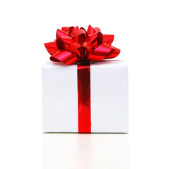 Gift box with ribbon end bow isolated on the white background, clipping path included.
