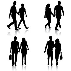 Set Silhouette man and woman walking hand in hand