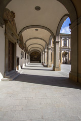 Fototapeta na wymiar Arches on the Florence streets, Tuscany, Italy