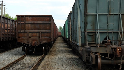 Fototapeta na wymiar Freight railway cars at the station Bohodukhiv