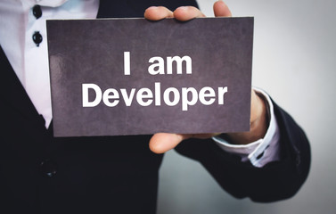Text I am Developer on a signboard.