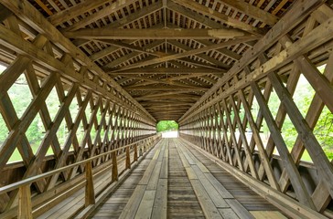 Interior of Covered Bridge - A wide angle view of interior of a century old wood Covered Bridge in...