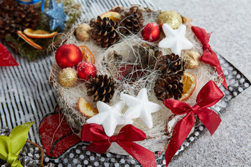 Christmas decorations pine cones, stars and baubles. 