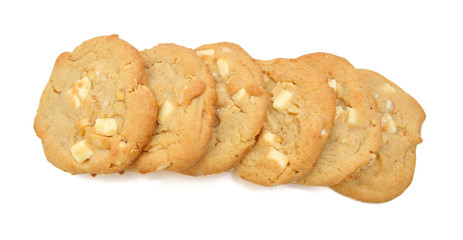Small stack of macadamia nut and white chocolate cookies. 