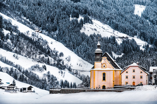 panoramic frost landscapes of Dolomite of alto adige - church under snow fall in ridanna valley ( Val Ridanna ) near Vipiteno - Racines - Italy