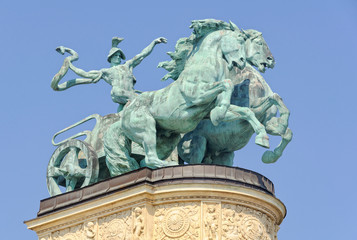 Obraz premium Statue of a Man with a Snake the symbol of War on the Heroes` Square - Budapest, Hungary