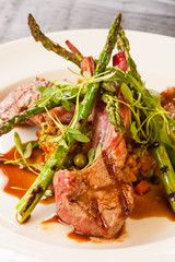 lamb lollipops with Indonesian fried rice and asparagus