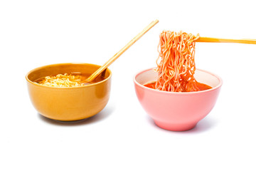 Instant noodles and cup isolated on white background.Instant noodles for people Do not like to eat vegetables.Instant noodles in black cup on white background.