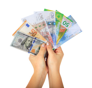 Female hands holding different money paper banknotes