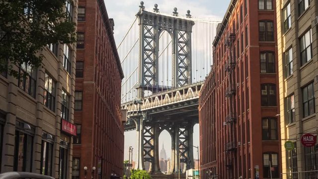 NY, USA – Moving timelapse/Hyperlapse of Manhattan bridge from Washington street on a beautiful day