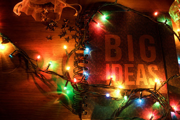 Christmas lights and notebook