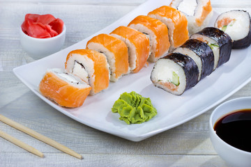 Philadelphia roll sushi with wasabi and soy. Sushi menu. Japanese food. 