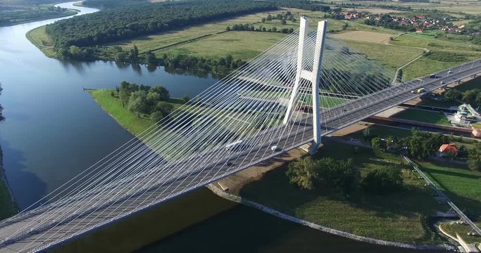 Modern bridge over the river, aerial drone