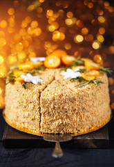 Christmas Honey cake on golden bokeh
