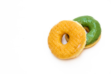 Fototapeta na wymiar Brown and green glazed donut isolated on white background