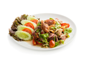 Roasted pork belly spicy salad isolated on white back ground