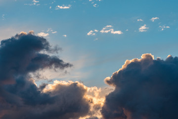 sunset behind thick cloud with beautiful glow of orange light