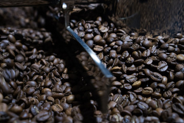 Mixing roasted coffee