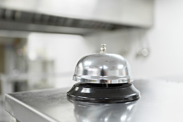 Alert bell on kitchen table in a restaurant