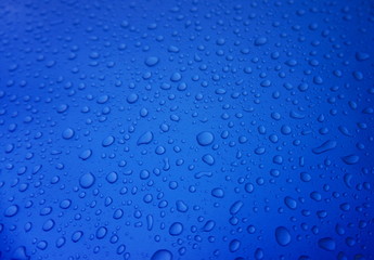 Rain drops on blue