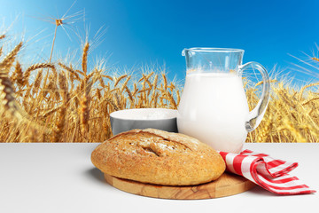 Bread and milk on the table