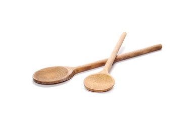 Wooden spoons isolated on white background