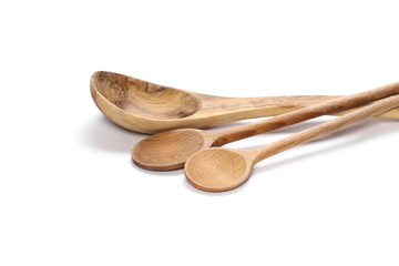 Wooden spoons isolated on white background