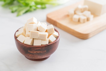 Fototapeta na wymiar tofu on wooden board
