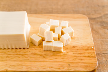 tofu on wooden board