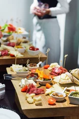 Fotobehang catering table with appetizers © Maksim Shebeko