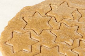 Pattern ginger biscuits. Raw dough. Star shape