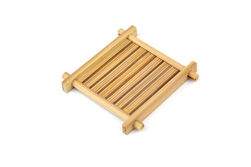 asian style old square bamboo coasters on white background.