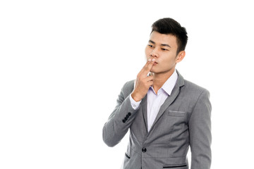 Portrait of a business man thinking with suit. Isolated on white background