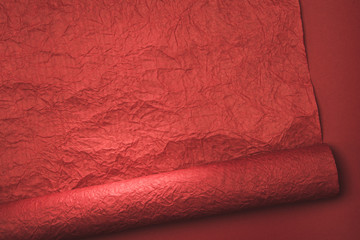 close up view of red wrapping paper texture