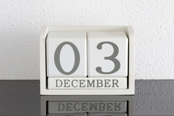 White block calendar present date 3 and month December