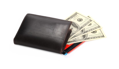 US hundred dollar bills and credit, debit cards in brown wallet, isolated on white background
