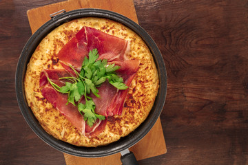 Overhead photo of Spanish tortilla with copy space
