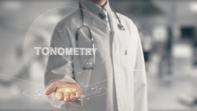 Doctor holding in hand Tonometry