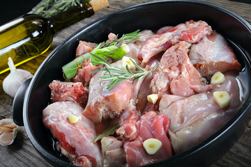 raw rabbit marinated with white wine, herbs